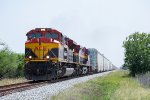 KCS 4012 leads a northbound through the outskirts of Victoria 